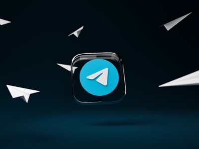 a blue button with a white arrow on it